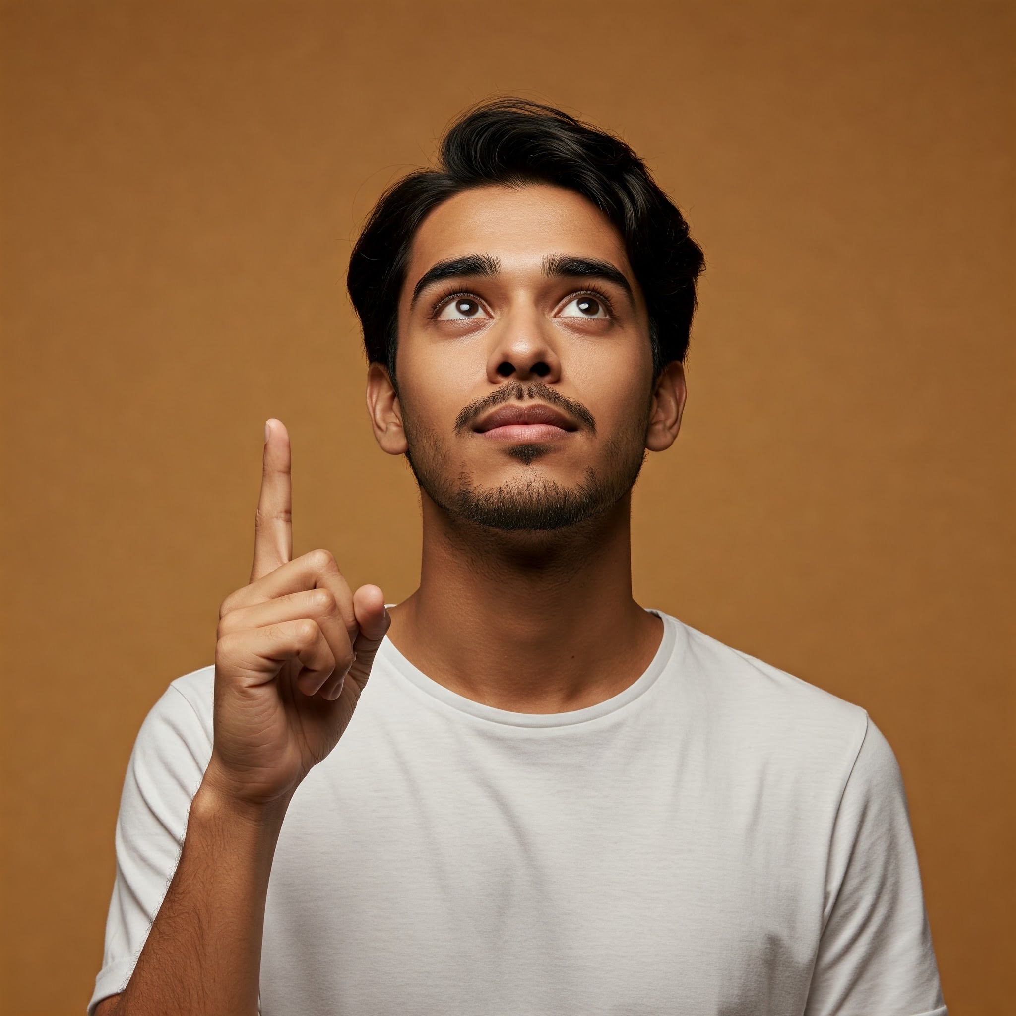 photo of Confident Man Pointing Upward